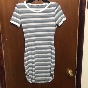 A Grey And White Striped T-Shirt Dress